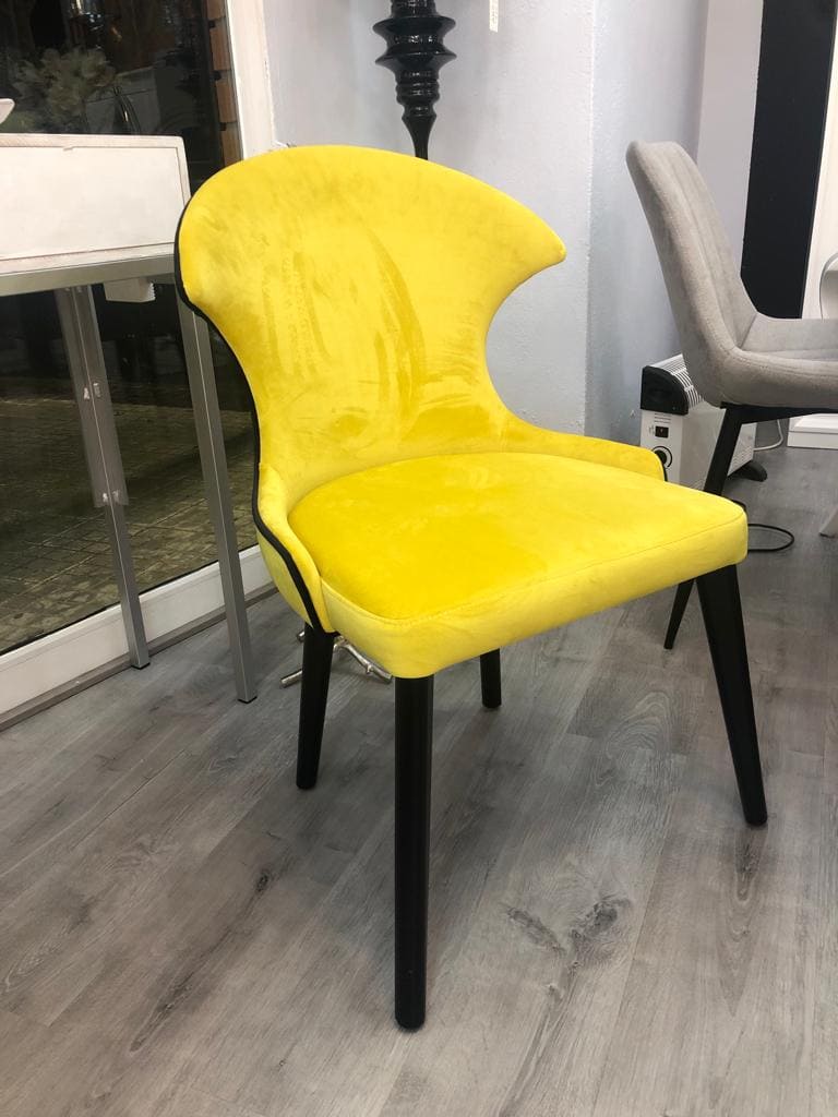 Silla tapizada en la tienda Dama Divano